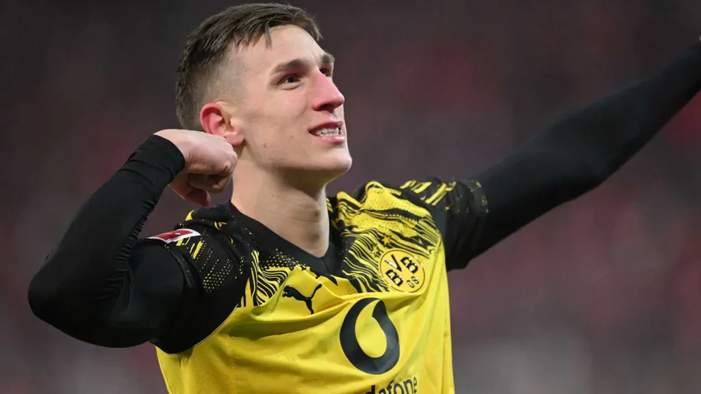 Nico Schlotterbeck in action for Borussia Dortmund, Schlotterbeck release clause links him to Liverpool and Real Madrid